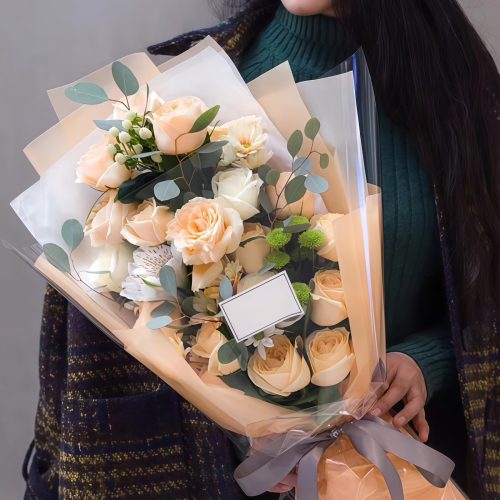 201902061438143482.jpg At the water's edge - Champagne roses and white roses bouquet